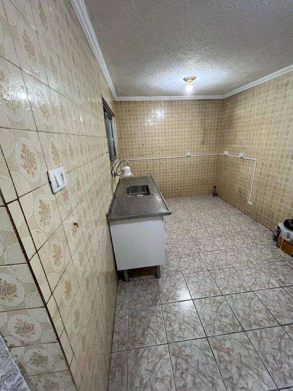 Casa para alugar com 2 quartos, 98m² - Foto 10